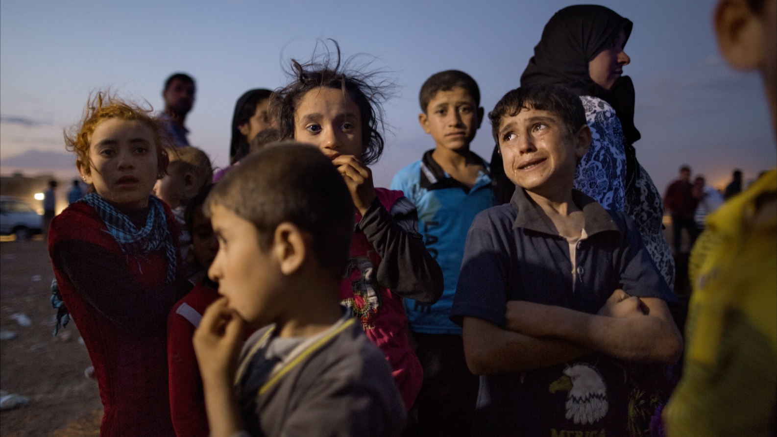 Fleeing ISIS Conflict: Photographing Refugees