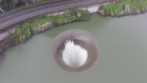 Mesmerizing Drone Footage Shows Whirlpool Draining This Lake